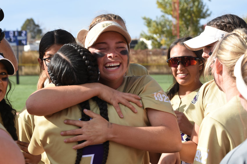 Holy Family players rejoice after winning the CHSAA 4A state softball championship at Aurora Sports Park Oct. 23.